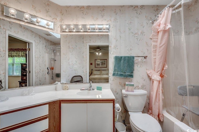 220 Gateway Dr, Little River, SC 29566 - bathroom featuring wallpapered walls, vanity, shower / tub combo with curtain, and a ceiling fan