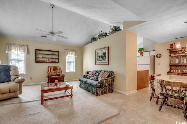 220 Gateway Dr, Little River, SC 29566 - living room featuring healthy amount of natural light, vaulted ceiling, ceiling fan, and light tile patterned floors