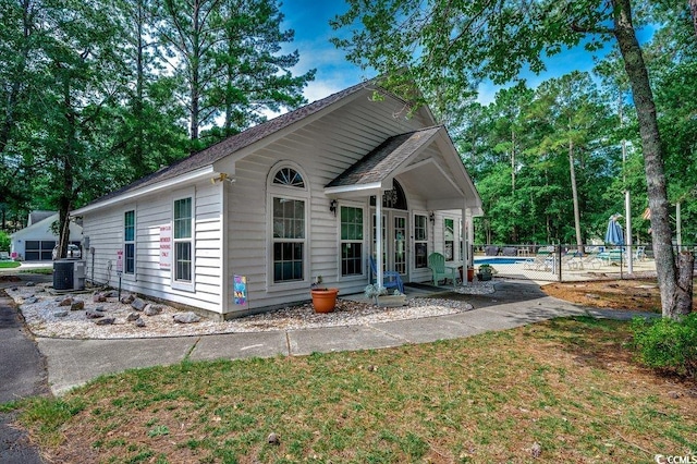 220 Gateway Dr, Little River, SC 29566 - view of front facade featuring roof with shingles