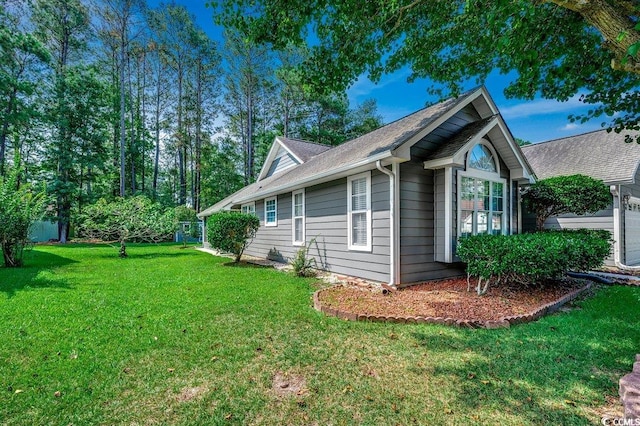 220 Gateway Dr, Little River, SC 29566 - view of home's exterior with a lawn