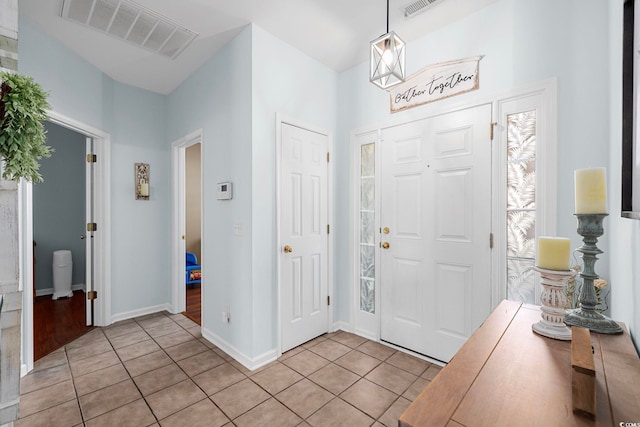 755 Wintercreeper Dr, Longs, SC 29568 - foyer with light tile patterned floors and baseboards