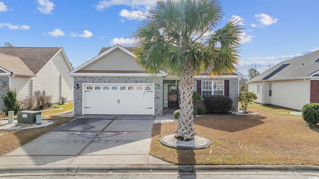755 Wintercreeper Dr, Longs, SC 29568 - view of front facade featuring driveway, an attached garage, and brick siding