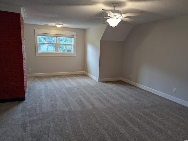 4719 National Dr, Myrtle Beach, SC 29579 - additional living space with a ceiling fan, carpet, a textured ceiling, and lofted ceiling