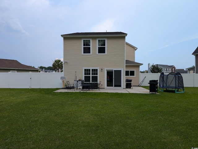 236 Haley Brooke Dr, Conway, SC 29526 - back of house with a patio, a trampoline, and a fenced backyard