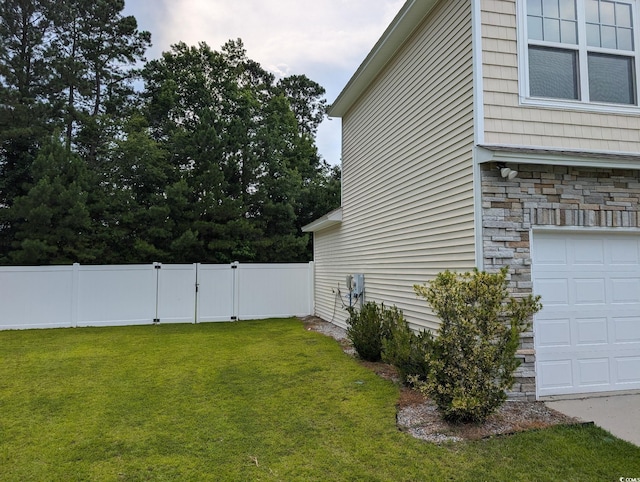 236 Haley Brooke Dr, Conway, SC 29526 - view of home's exterior featuring stone siding and a garage