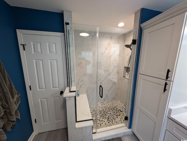 236 Haley Brooke Dr, Conway, SC 29526 - bathroom with a marble finish shower, recessed lighting, vanity, and wood finished floors