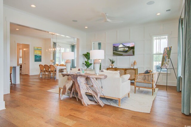 1627 Sayebrook Pkwy, Myrtle Beach, SC 29588 - living area with ornamental molding, light wood-type flooring, a ceiling fan, a chandelier, and recessed lighting