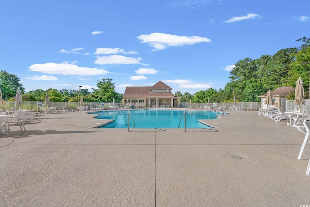 312 Caldera Ct, Murrells Inlet, SC 29576 - community pool featuring a patio
