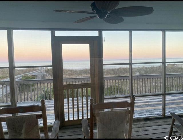 18 Canvas Back Cv Unit 122, Georgetown, SC 29440 - sunroom / solarium featuring a water view and wood finished floors