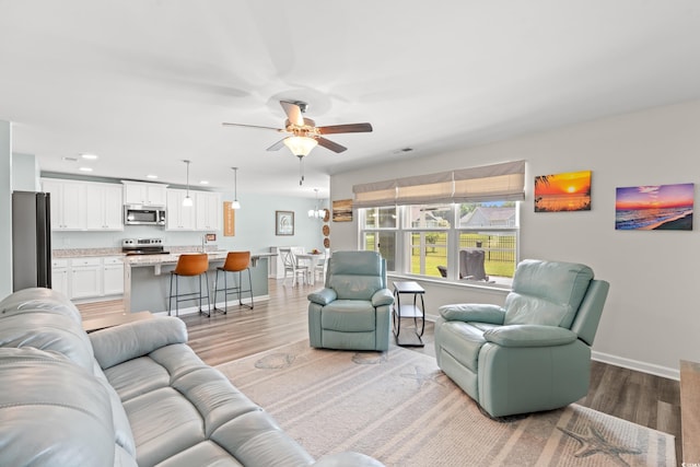 1108 Donald St, Conway, SC 29527 - living area featuring light wood-style flooring, a ceiling fan, and recessed lighting