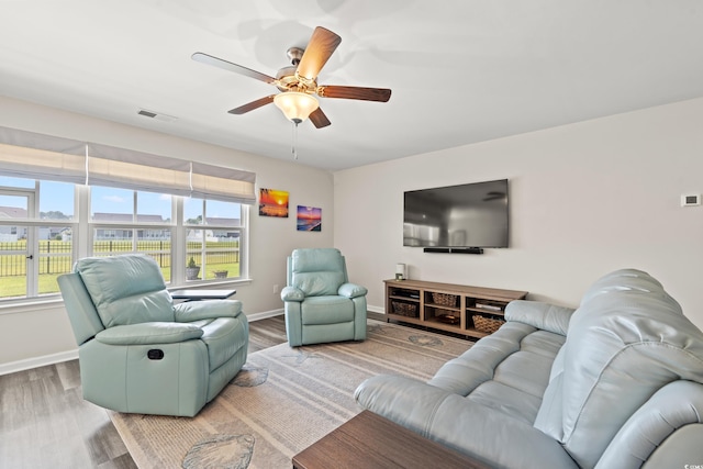1108 Donald St, Conway, SC 29527 - living room featuring wood finished floors and a ceiling fan