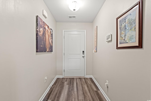 1108 Donald St, Conway, SC 29527 - doorway with dark wood-style floors and baseboards