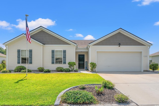 1108 Donald St, Conway, SC 29527 - view of front of house with a garage, driveway, and a front yard