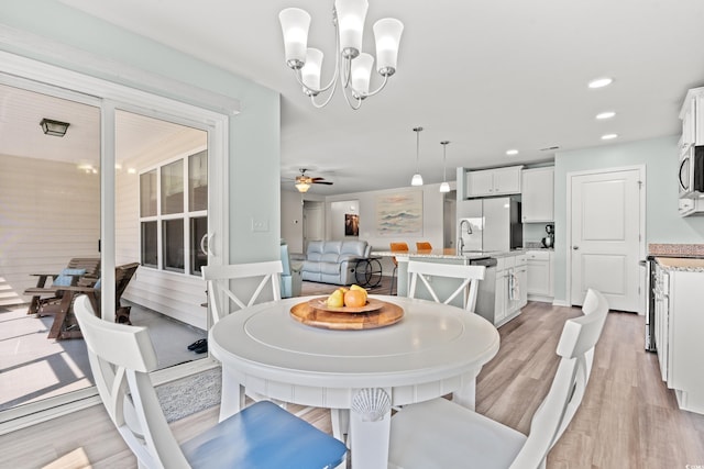 1108 Donald St, Conway, SC 29527 - dining area with light wood finished floors, a chandelier, ceiling fan, and recessed lighting