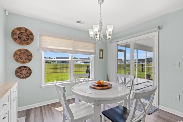1108 Donald St, Conway, SC 29527 - dining room with a chandelier and wood finished floors