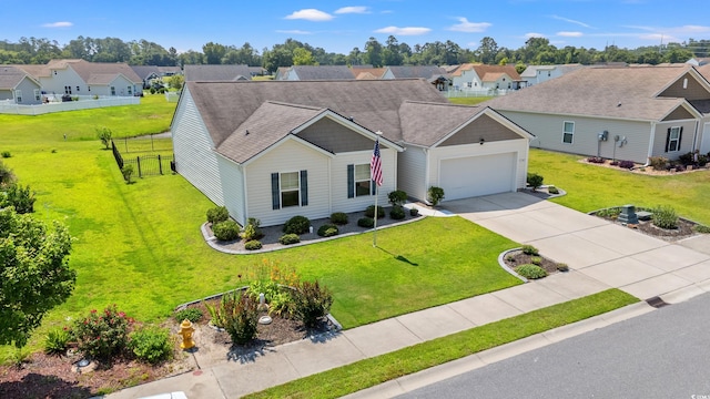 1108 Donald St, Conway, SC 29527 - view of front of house featuring an attached garage, a residential view, driveway, and a shingled roof