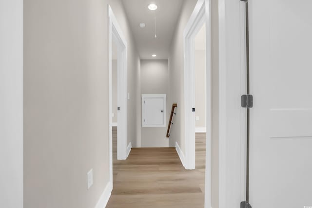 4329 Landing Rd, Little River, SC 29566 - hallway with an upstairs landing, light wood-style flooring, recessed lighting, and attic access