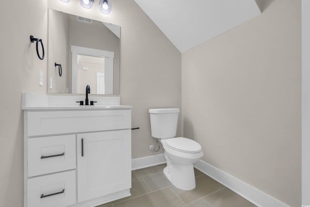 4329 Landing Rd, Little River, SC 29566 - half bathroom featuring vanity, lofted ceiling, and tile patterned flooring