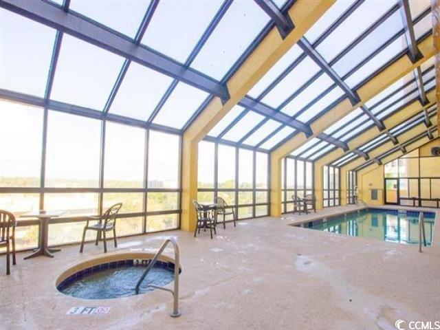 6900 N Ocean Blvd Unit 834, Myrtle Beach, SC 29572 - indoor pool with a hot tub