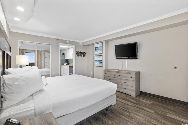 6900 N Ocean Blvd Unit 834, Myrtle Beach, SC 29572 - bedroom with dark wood-type flooring, ornamental molding, recessed lighting, and connected bathroom