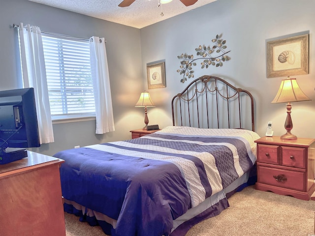 3700 Golf Colony Ln Unit 26-O, Little River, SC 29566 - carpeted bedroom featuring a ceiling fan and a textured ceiling