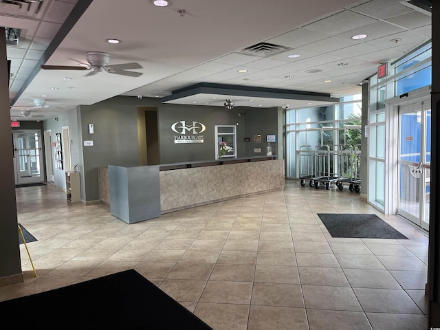 2100 Sea Mountain Hwy Unit 520, North Myrtle Beach, SC 29582 - reception area with a ceiling fan, a drop ceiling, and a wall of windows