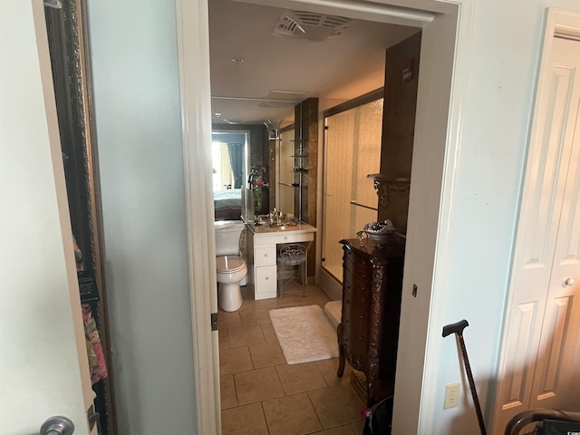 2100 Sea Mountain Hwy Unit 520, North Myrtle Beach, SC 29582 - bathroom featuring tile patterned flooring and a shower