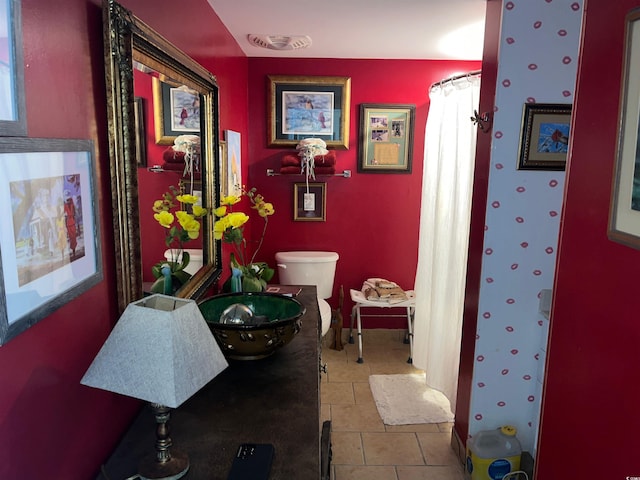 2100 Sea Mountain Hwy Unit 520, North Myrtle Beach, SC 29582 - bathroom featuring tile patterned floors, a shower with shower curtain, and vanity