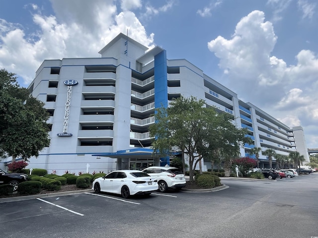 2100 Sea Mountain Hwy Unit 520, North Myrtle Beach, SC 29582 - view of building exterior with uncovered parking