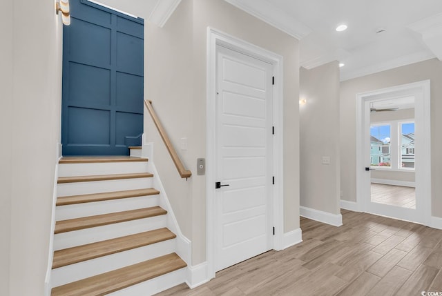 1112 Whispering Winds Dr, Myrtle Beach, SC 29579 - staircase with crown molding, wood finished floors, and recessed lighting