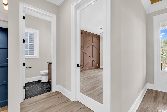 1112 Whispering Winds Dr, Myrtle Beach, SC 29579 - corridor with wood finished floors and crown molding