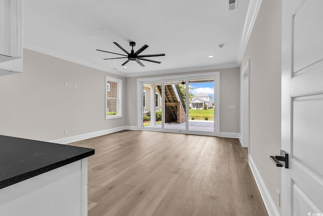1112 Whispering Winds Dr, Myrtle Beach, SC 29579 - unfurnished living room featuring crown molding, light wood-style flooring, recessed lighting, and ceiling fan