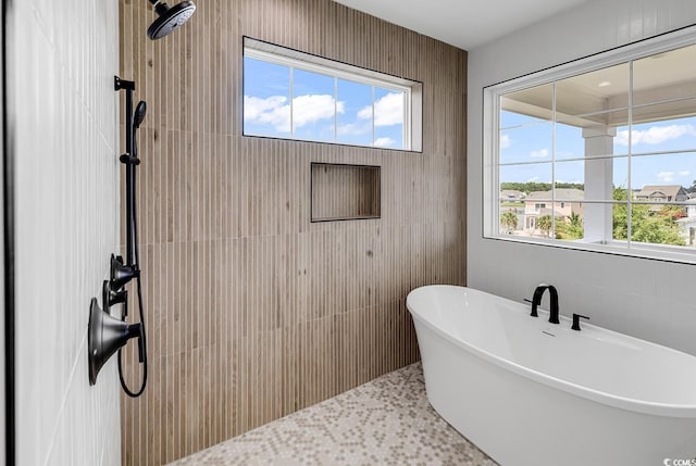 1112 Whispering Winds Dr, Myrtle Beach, SC 29579 - bathroom with a freestanding tub, healthy amount of natural light, and tiled shower