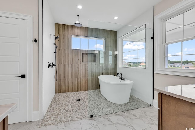 1112 Whispering Winds Dr, Myrtle Beach, SC 29579 - full bathroom featuring marble finish floors, a walk in shower, a freestanding bath, vanity, and recessed lighting