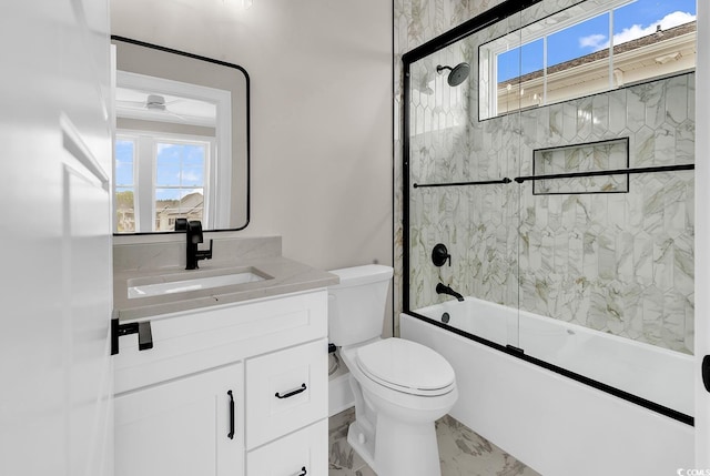 1112 Whispering Winds Dr, Myrtle Beach, SC 29579 - full bathroom featuring vanity, plenty of natural light, enclosed tub / shower combo, and marble finish floors