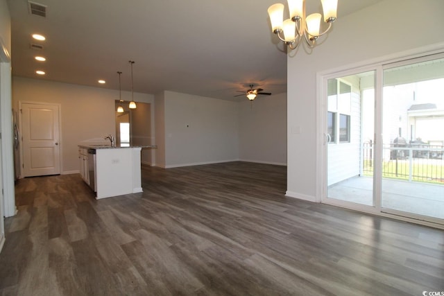 2681 Ophelia Way, Myrtle Beach, SC 29577 - unfurnished living room featuring dark wood finished floors, recessed lighting, a ceiling fan, and a chandelier