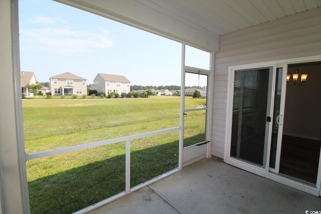 2681 Ophelia Way, Myrtle Beach, SC 29577 - unfurnished sunroom with a chandelier and a residential view