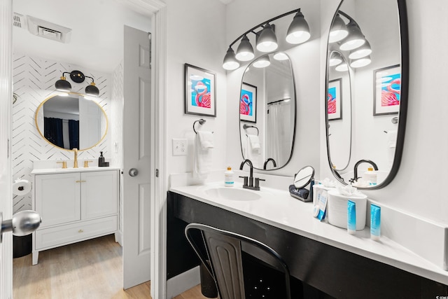 5523 N Ocean Blvd Unit 2006, Myrtle Beach, SC 29577 - full bathroom with wood finished floors and two vanities