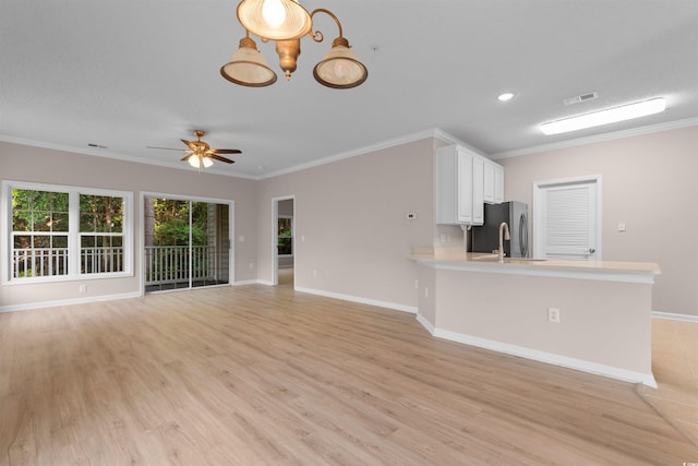5870 Longwood Dr Unit 201, Murrells Inlet, SC 29576 - unfurnished living room featuring light wood-style floors, crown molding, ceiling fan, and recessed lighting