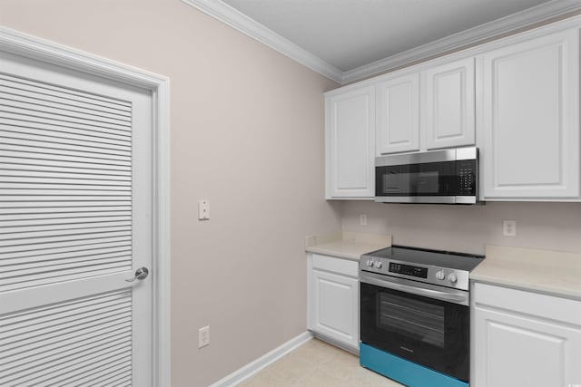 5870 Longwood Dr Unit 201, Murrells Inlet, SC 29576 - kitchen featuring stainless steel appliances, light countertops, white cabinetry, and crown molding