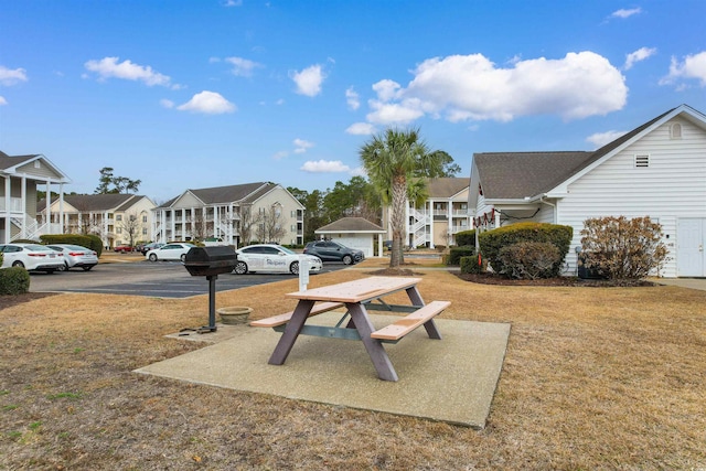 5870 Longwood Dr Unit 201, Murrells Inlet, SC 29576 - view of community with a residential view, uncovered parking, and a lawn