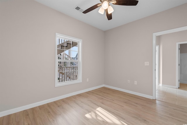 5870 Longwood Dr Unit 201, Murrells Inlet, SC 29576 - spare room featuring a ceiling fan and light wood-style floors