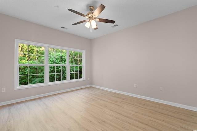 5870 Longwood Dr Unit 201, Murrells Inlet, SC 29576 - empty room with light wood finished floors and ceiling fan