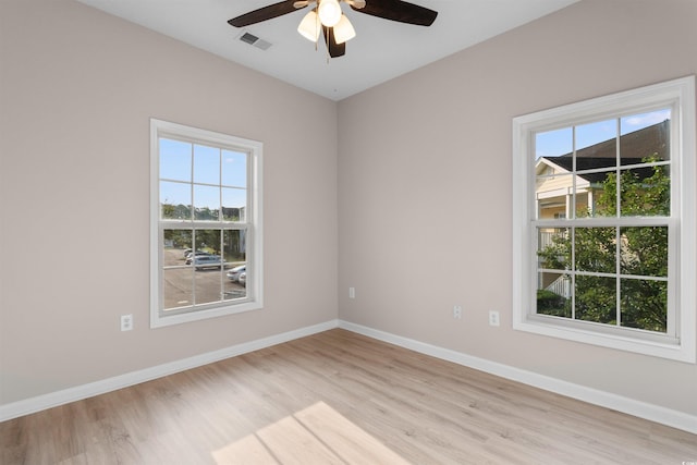 5870 Longwood Dr Unit 201, Murrells Inlet, SC 29576 - spare room with light wood-style floors and a ceiling fan