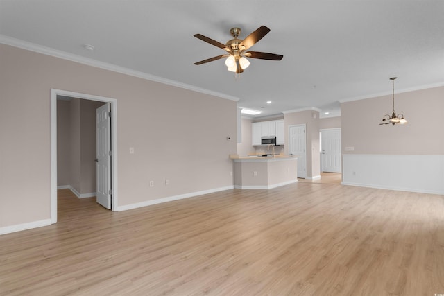 5870 Longwood Dr Unit 201, Murrells Inlet, SC 29576 - unfurnished living room with crown molding, ceiling fan, recessed lighting, a chandelier, and light wood-style flooring