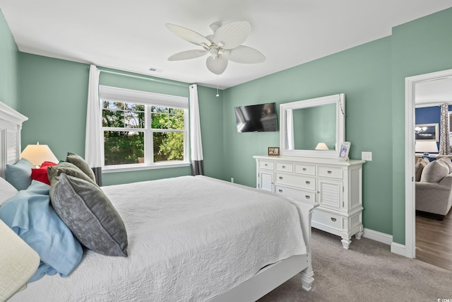 1007 Oak Marsh Ln, North Myrtle Beach, SC 29582 - carpeted bedroom featuring baseboards and a ceiling fan