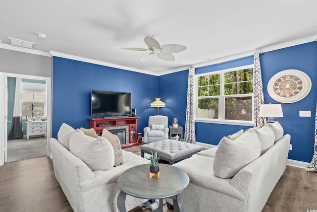 1007 Oak Marsh Ln, North Myrtle Beach, SC 29582 - living area featuring ceiling fan, wood finished floors, and ornamental molding