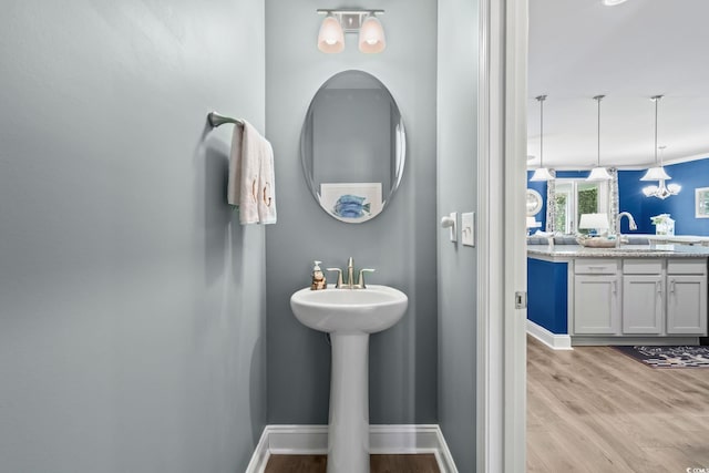 1007 Oak Marsh Ln, North Myrtle Beach, SC 29582 - bathroom featuring wood finished floors and baseboards