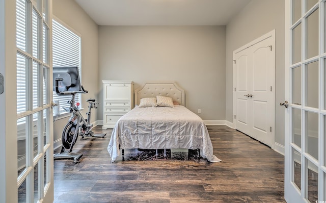 520 Oak Pond Ct, Conway, SC 29526 - bedroom featuring french doors and dark wood finished floors