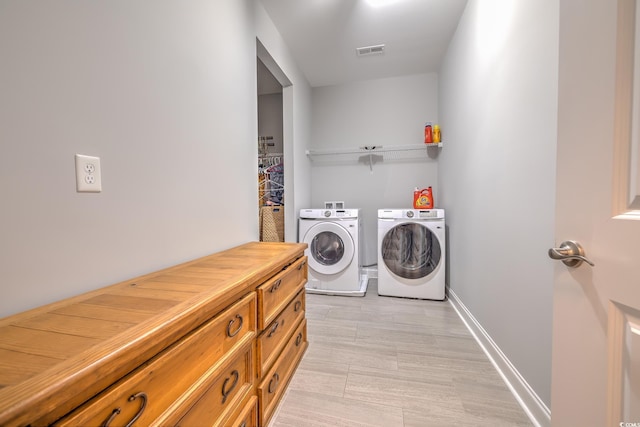 520 Oak Pond Ct, Conway, SC 29526 - washroom featuring independent washer and dryer and light wood-type flooring
